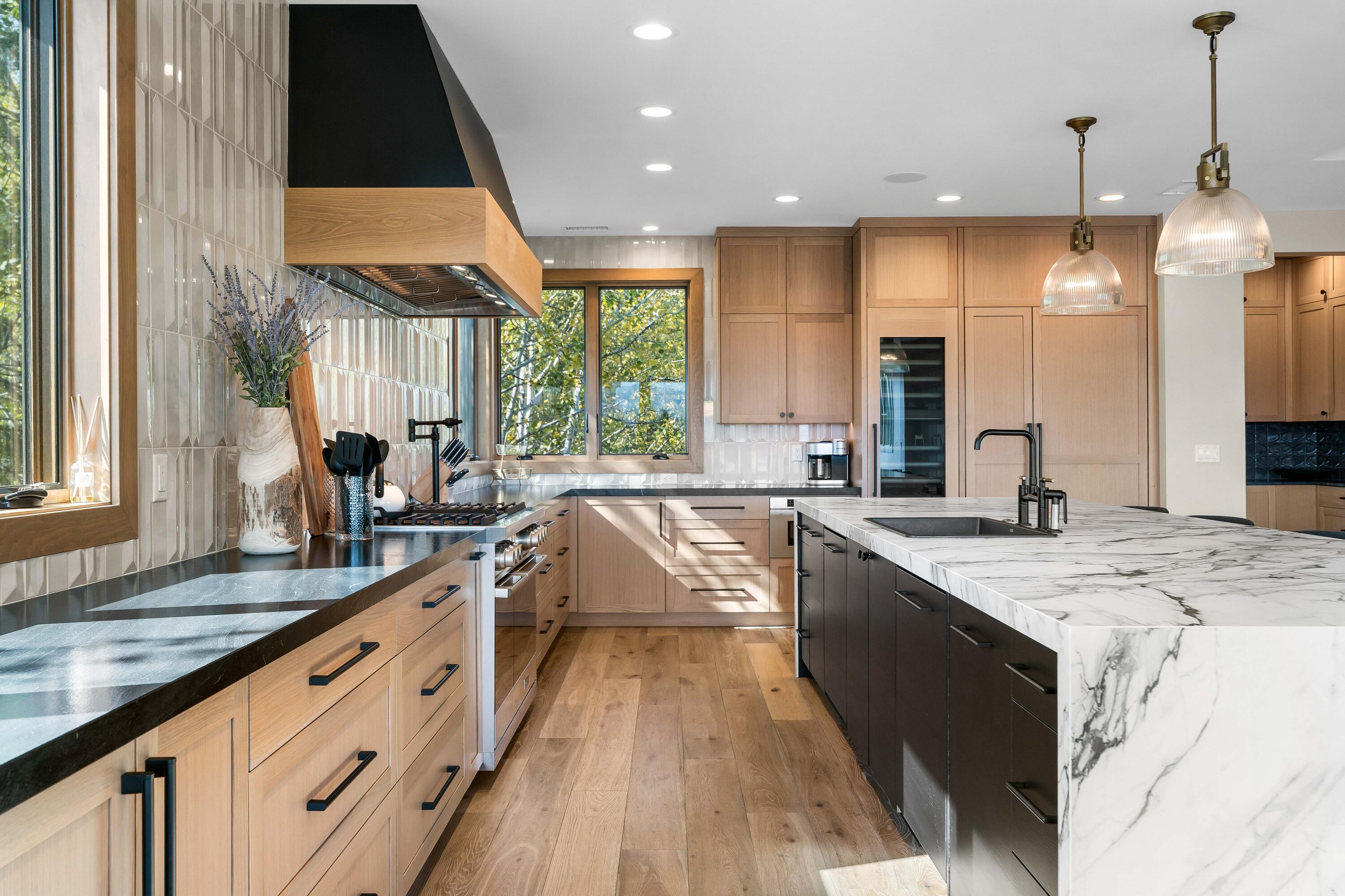 56878 River Road, Unit 2 Sunriver, OR 97707 - Photo 11 of 67 High-end oven/range, 2 dishwashers, pot filler, wine refrigerator and oversized refrigerator/freezer.