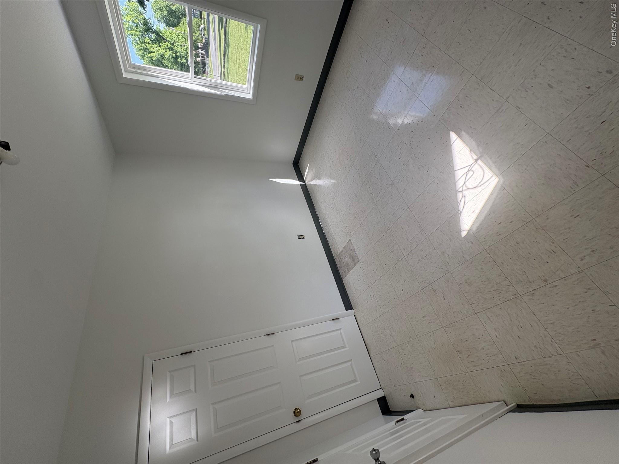 11 Fallkill Avenue Poughkeepsie, NY 12601 - Photo 6 of 9 a view of an empty room and a window