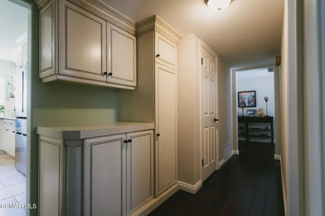 a view of a dining room with furniture and window