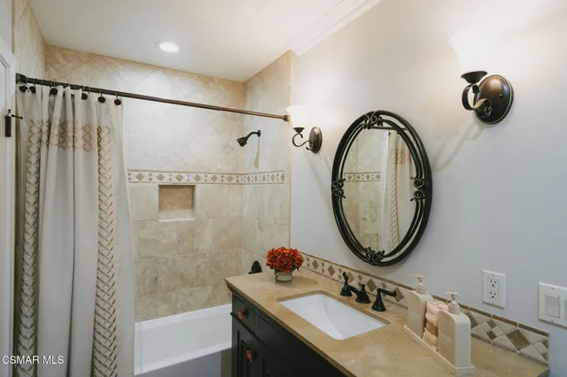 a room with furniture wooden floor and a window