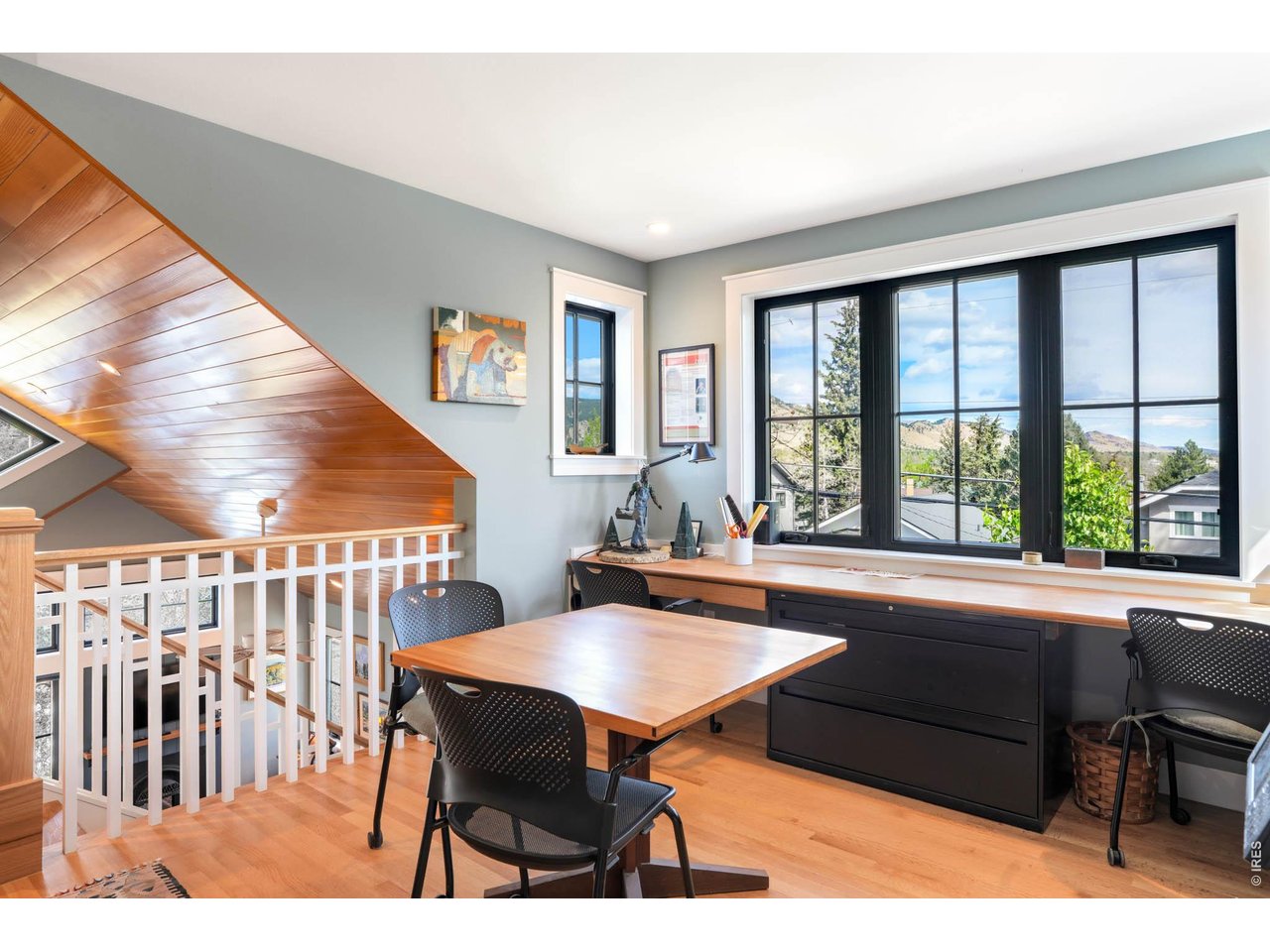 1321 9th Street, Unit A Boulder, CO 80302 - Photo 22 of 45 a living room with furniture pool table and a large window