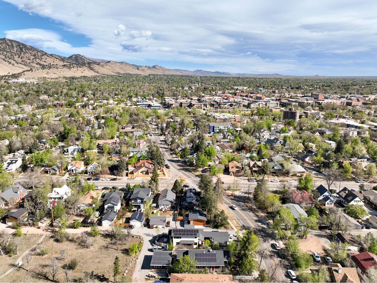 1321 9th Street, Unit A Boulder, CO 80302 - Photo 42 of 45 an aerial view of residential building and trees around