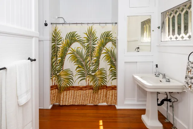 a bed room with a bed and a window