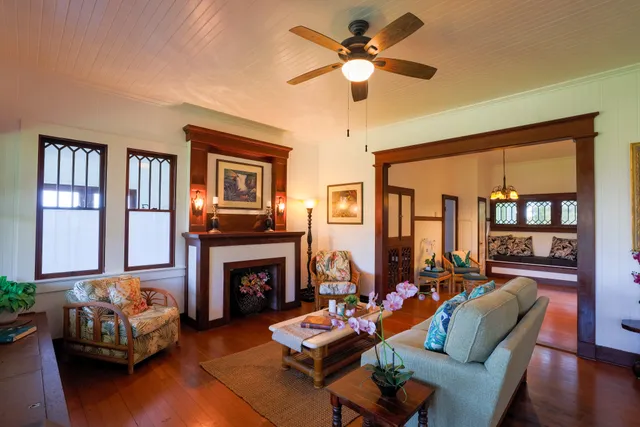 a dining room with furniture and windows