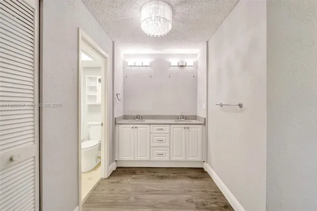 a bathroom with a toilet and a bathtub