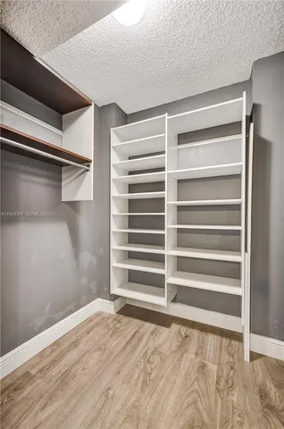 a view of a porch with a floor to ceiling window