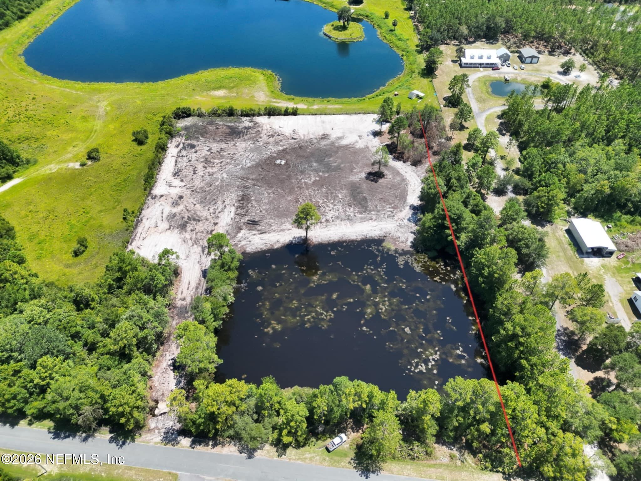 0 Quail Road Callahan, FL 32011 - Photo 2 of 7 an aerial view of a house