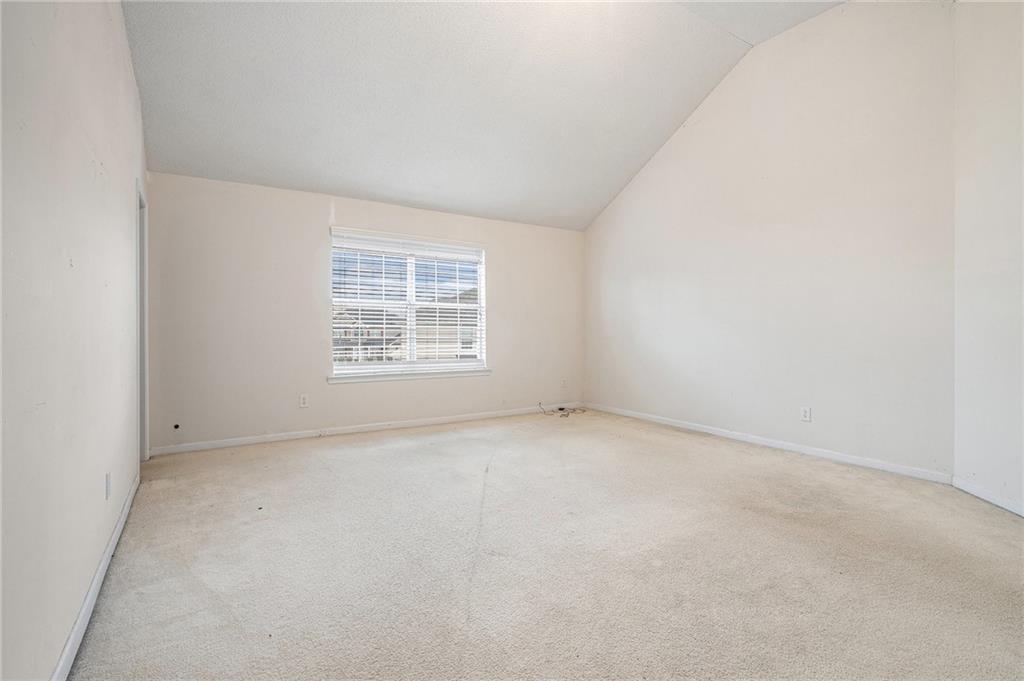 1915 Cornerstone Pass Way Conyers, GA 30012 - Photo 15 of 25 an empty room with a window