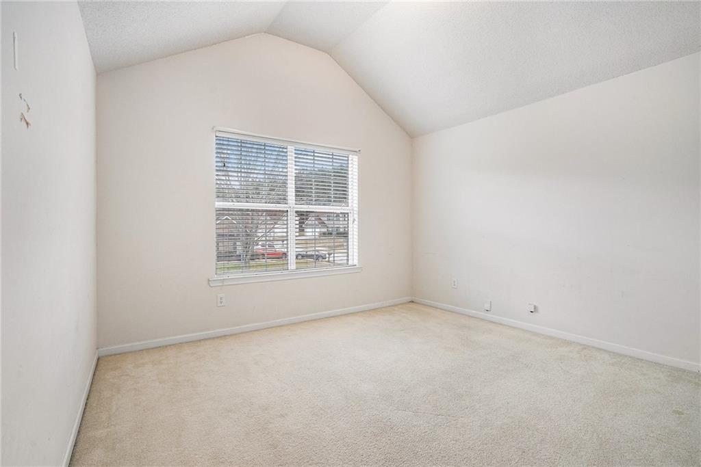 1915 Cornerstone Pass Way Conyers, GA 30012 - Photo 21 of 25 an empty room with a window