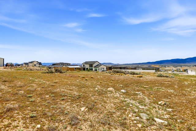 2930 Jojo Road, Unit 110 Eagle Mountain, UT 84005 - Photo 22 of 22 View of yard with a mountain view and a residential view