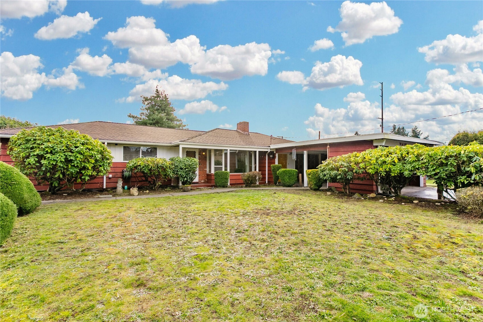 7416 25th Street West Tacoma, WA 98466 - Photo 1 of 39 a front view of a house with garden