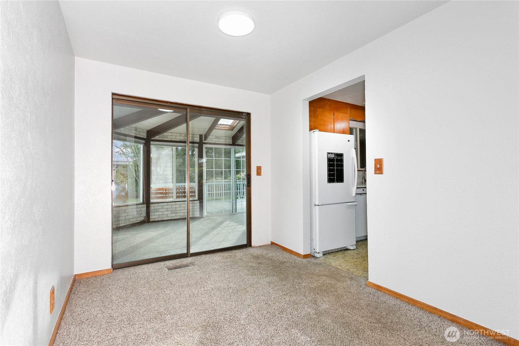 7416 25th Street West Tacoma, WA 98466 - Photo 11 of 39 an empty room with a bathroom and a mirror