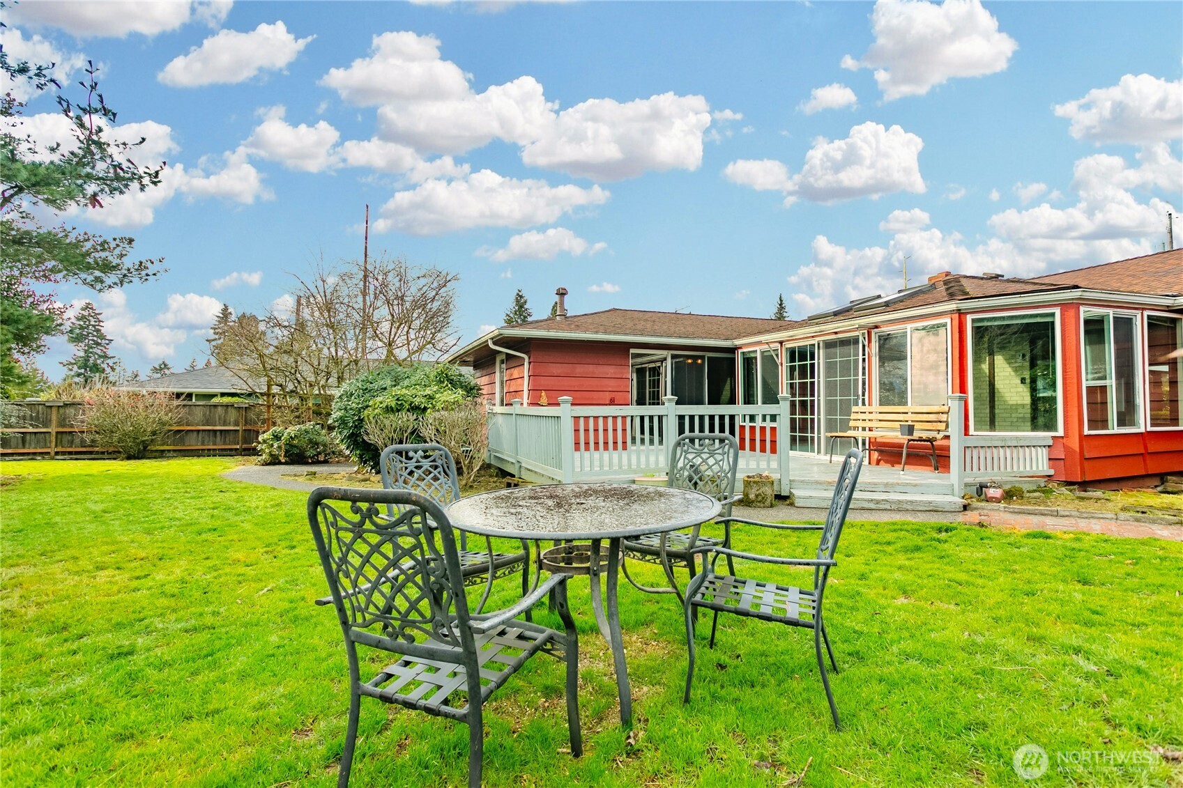 7416 25th Street West Tacoma, WA 98466 - Photo 33 of 39 a view of a chair and table in backyard of the house