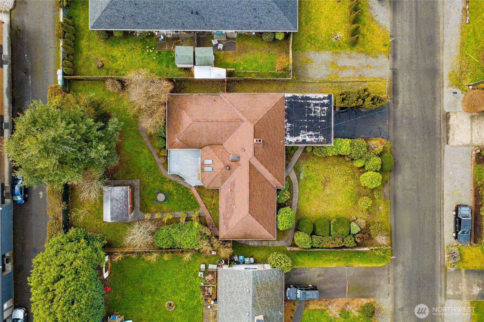 7416 25th Street West Tacoma, WA 98466 - Photo 36 of 39 an aerial view of a house with a swimming pool