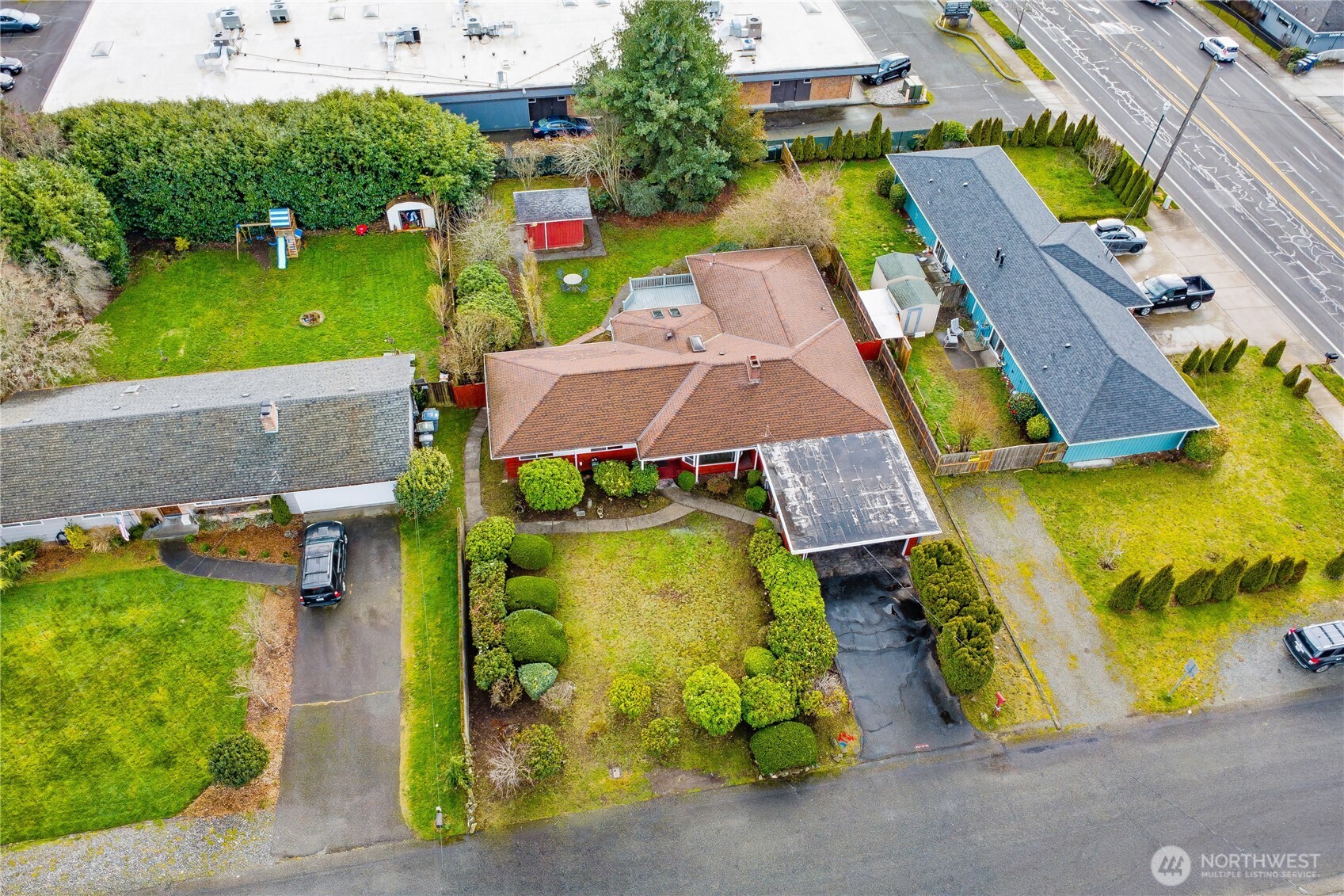7416 25th Street West Tacoma, WA 98466 - Photo 37 of 39 an aerial view of a house with a garden and swimming pool