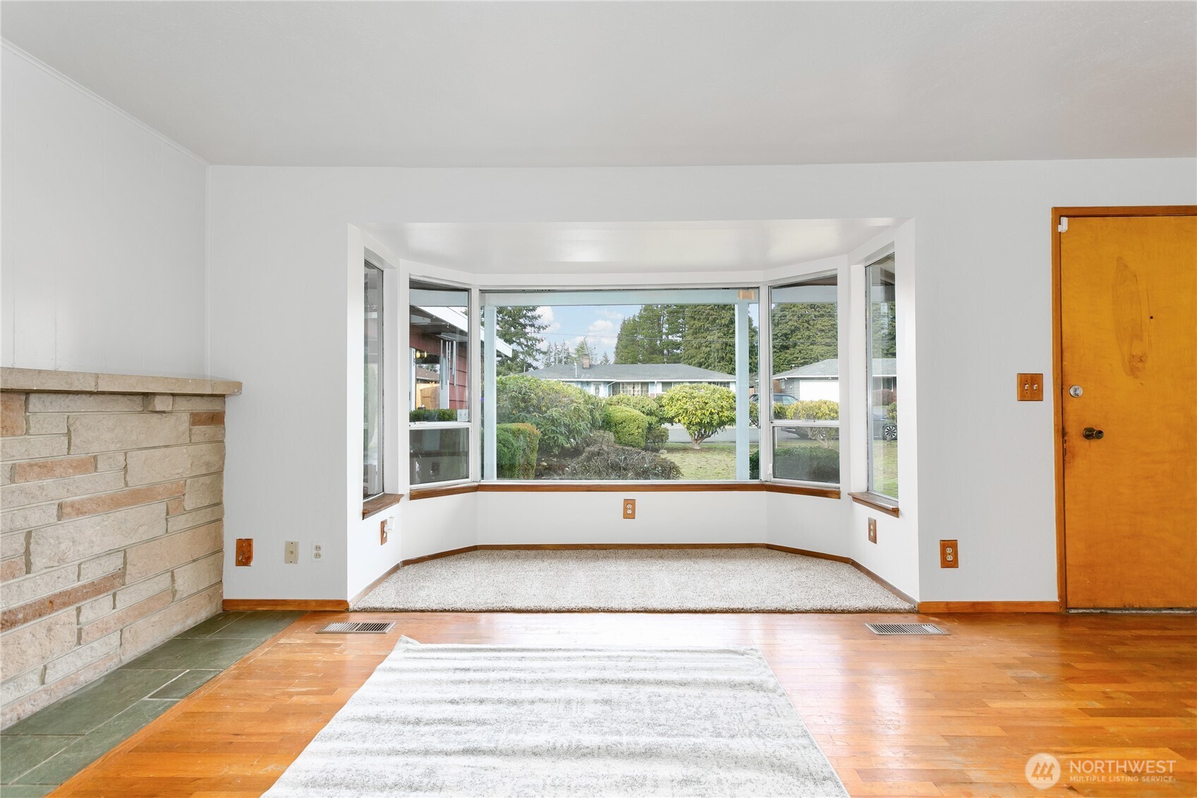 7416 25th Street West Tacoma, WA 98466 - Photo 8 of 39 a view of an empty room with a window
