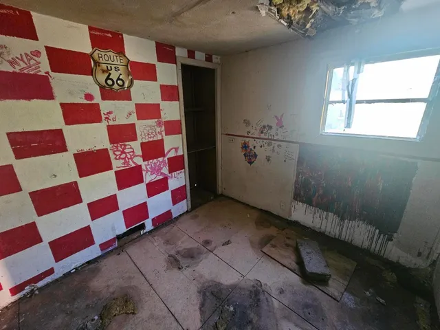 a view of a bathroom with a sink and a shower