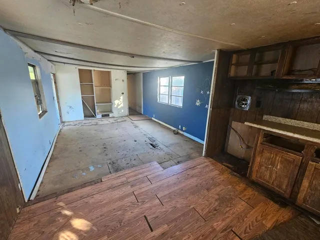 a view of kitchen and windows