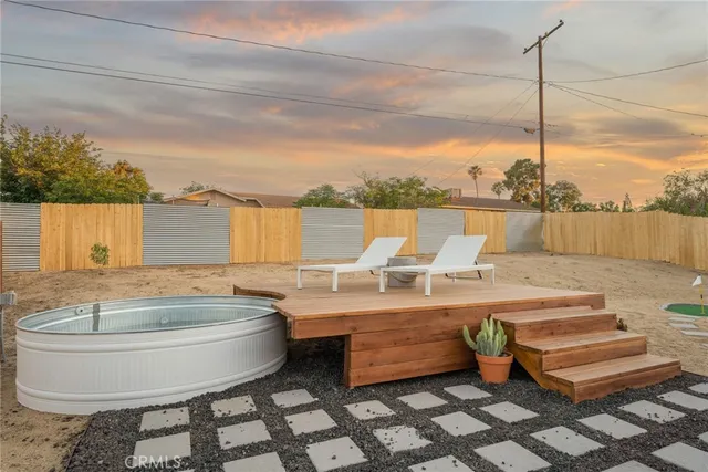 a view of swimming pool with a yard