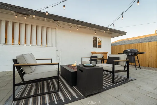 a outdoor space with a tub and city view