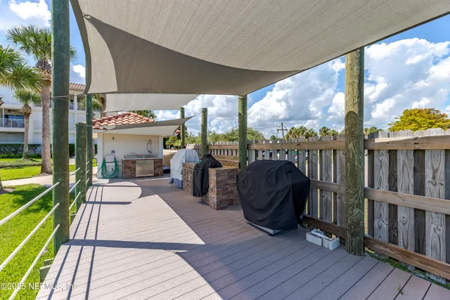 a view of a swimming pool with a lounge chairs