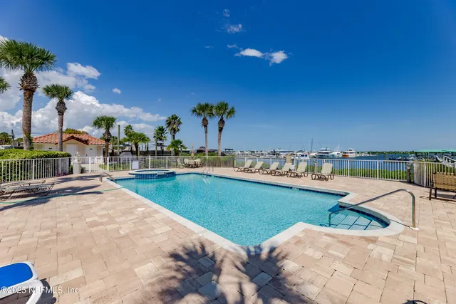 a view of a balcony with chairs