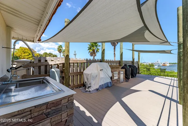 a view of a swimming pool and lounge chair