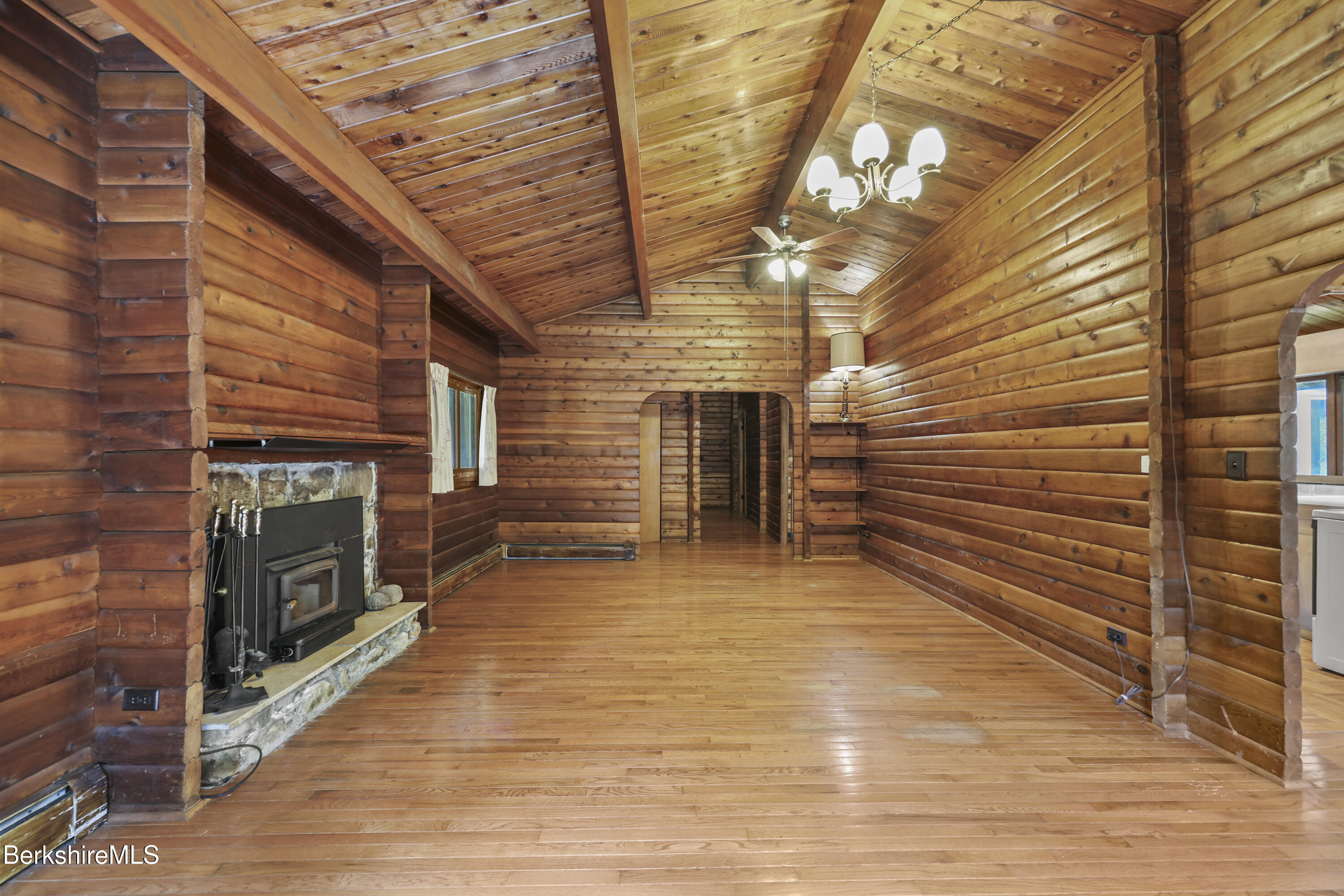 240 Kirchner Road Dalton, MA 01226 - Photo 15 of 51 a view of a livingroom with wooden floor and a ceiling fan