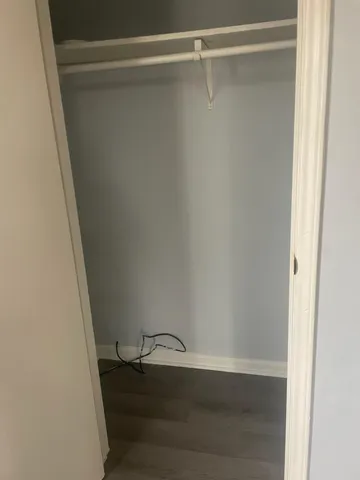 a view of an empty walk in closet