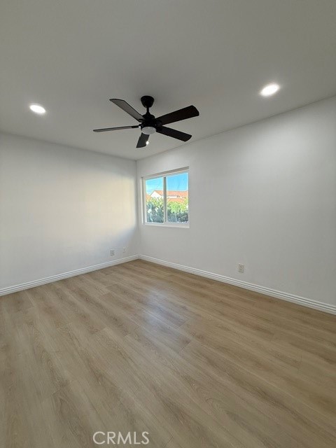 18104 Rio Seco Drive Rowland Heights, CA 91748 - Photo 20 of 31 an empty room with wooden floor and windows