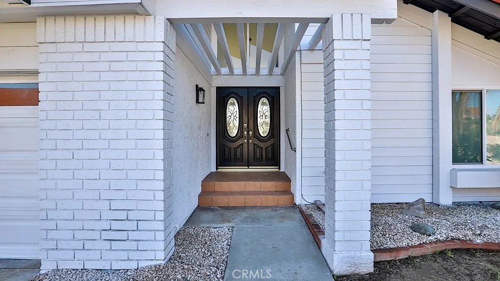 18104 Rio Seco Drive Rowland Heights, CA 91748 - Photo 4 of 31 a hallway with a door