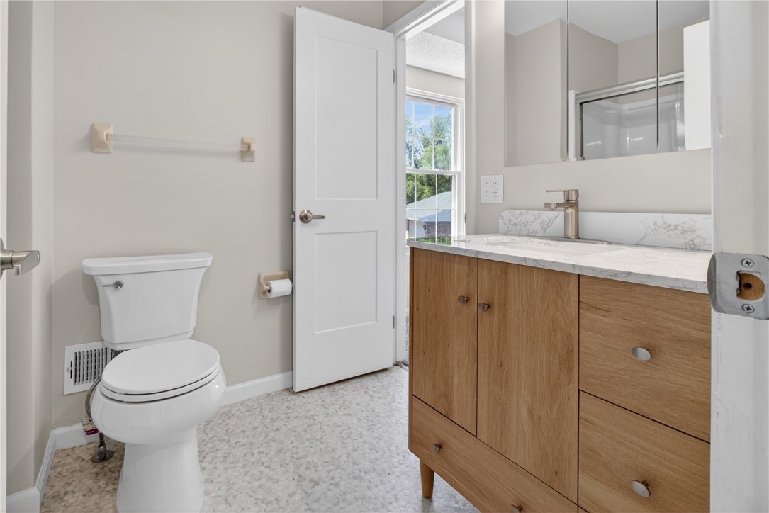 561 French Road Brighton, NY 14618 - Photo 23 of 45 MAIN BATH W/ ENTRY INTO THE PRIMARY BDRM. BEHIND T