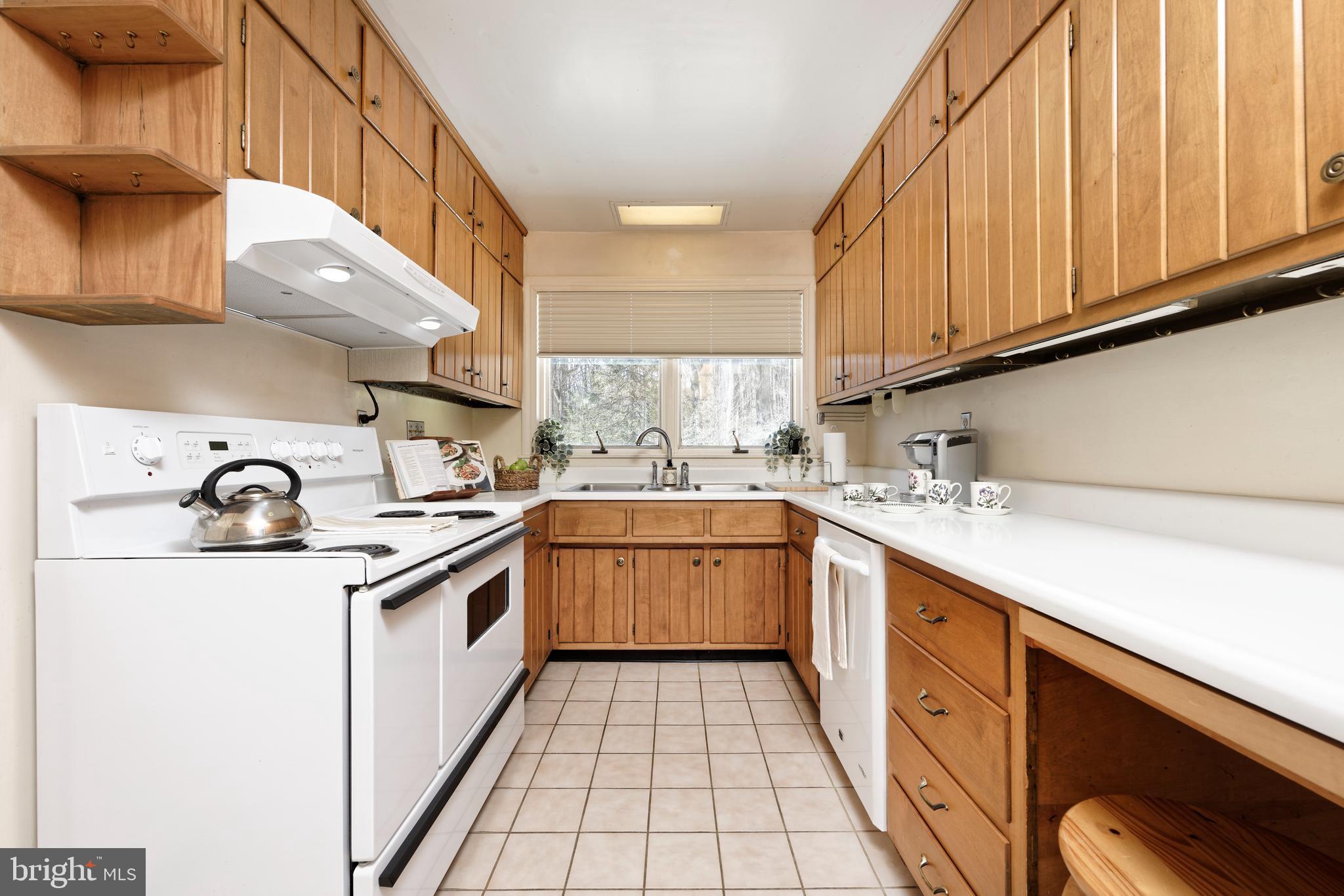 32843 Mt Weather Road Bluemont, VA 20135 - Photo 12 of 42 Galley kitchen has picture window over the sink.