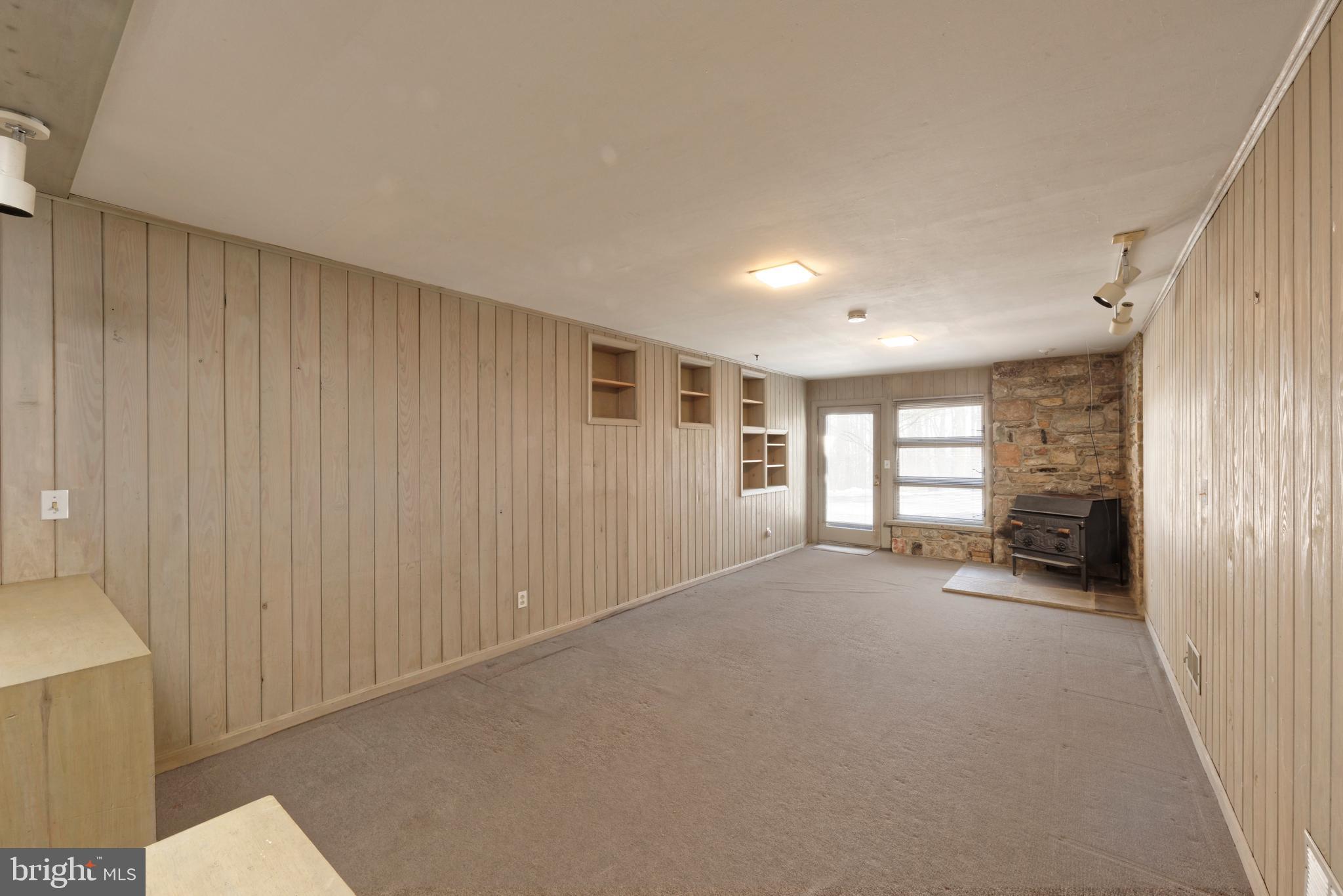 32843 Mt Weather Road Bluemont, VA 20135 - Photo 25 of 42 Walk-out lower level has Rec Room w/a wood stove