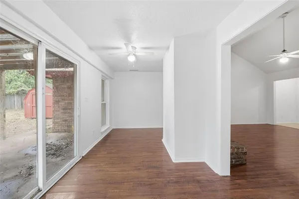 a view of hallway with livingroom