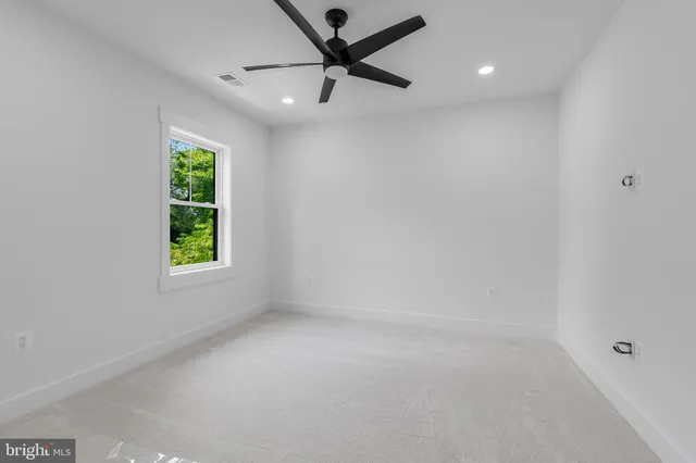 a bathroom with a sink a toilet and bathtub