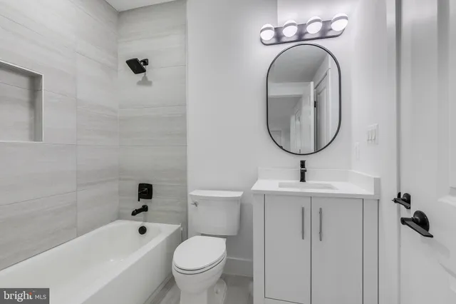 a view of deck with a large trees