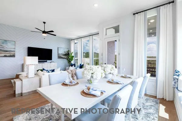 a view of a dining room with furniture