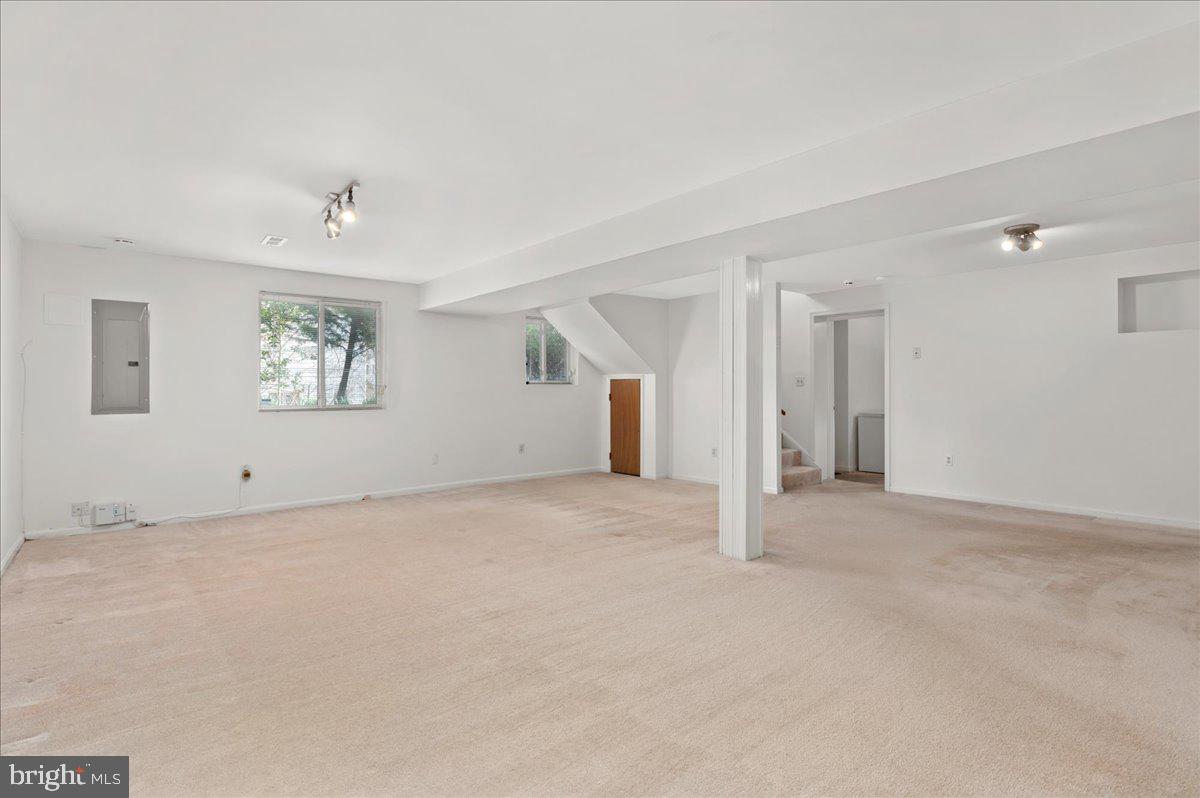 8606 Grubb Road Chevy Chase, MD 20815 - Photo 21 of 31 Large sunny lower level family room