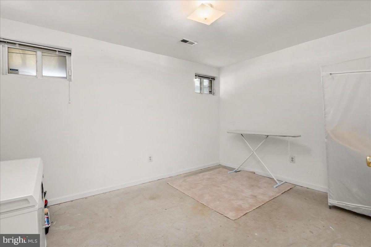 8606 Grubb Road Chevy Chase, MD 20815 - Photo 27 of 31 Storage room with extra freezer