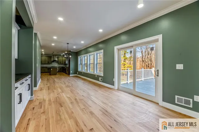 a view of livingroom with furniture wooden floor and window