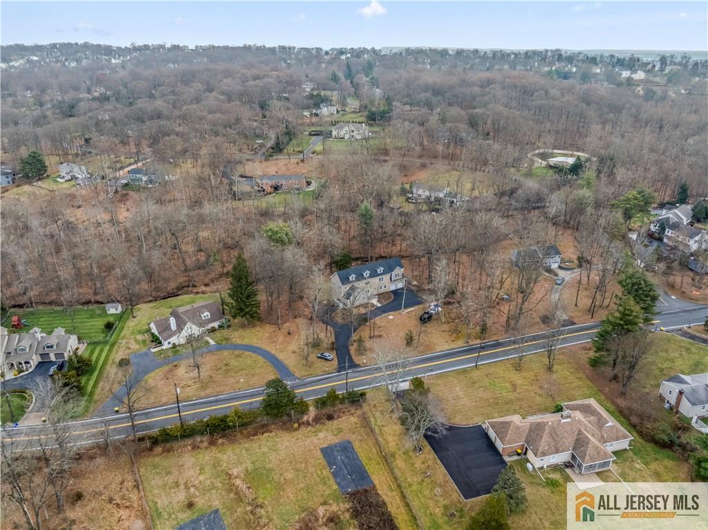 28 King George Road Warren, NJ 07059 - Photo 57 of 63 an aerial view of a house with a yard