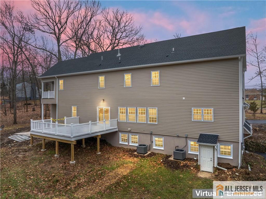 28 King George Road Warren, NJ 07059 - Photo 8 of 63 a backyard of a house with table and chairs