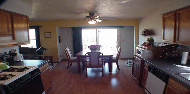 1032 South Trainer Road Rockford, IL 61108 - Photo 3 of 6 a view of a dining room with furniture window and wooden floor