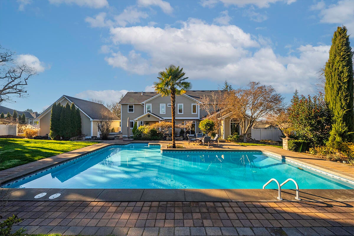 3343 Lone Pine Road Medford, OR 97504 - Photo 10 of 47 Rear Elevation Framed By the Saltwater Pool