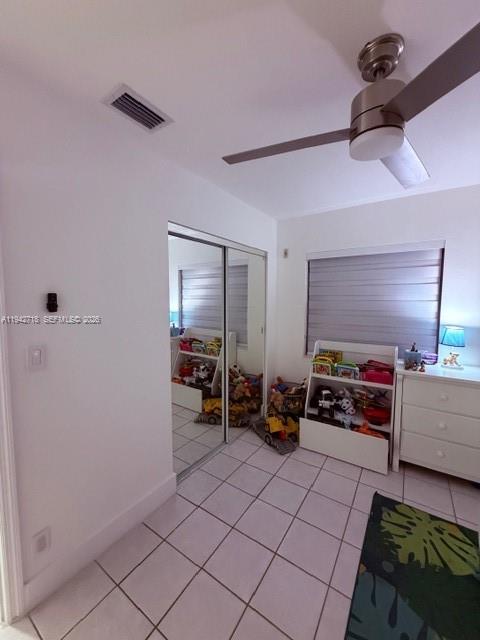 12840 Southwest 43rd Drive, Unit 274B Miami, FL 33175 - Photo 11 of 15 a bedroom with furniture and a window