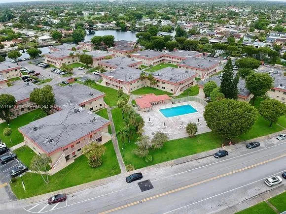 an aerial view of a house with a garden