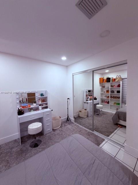 12840 Southwest 43rd Drive, Unit 274B Miami, FL 33175 - Photo 5 of 15 a room with furniture and a flat screen tv