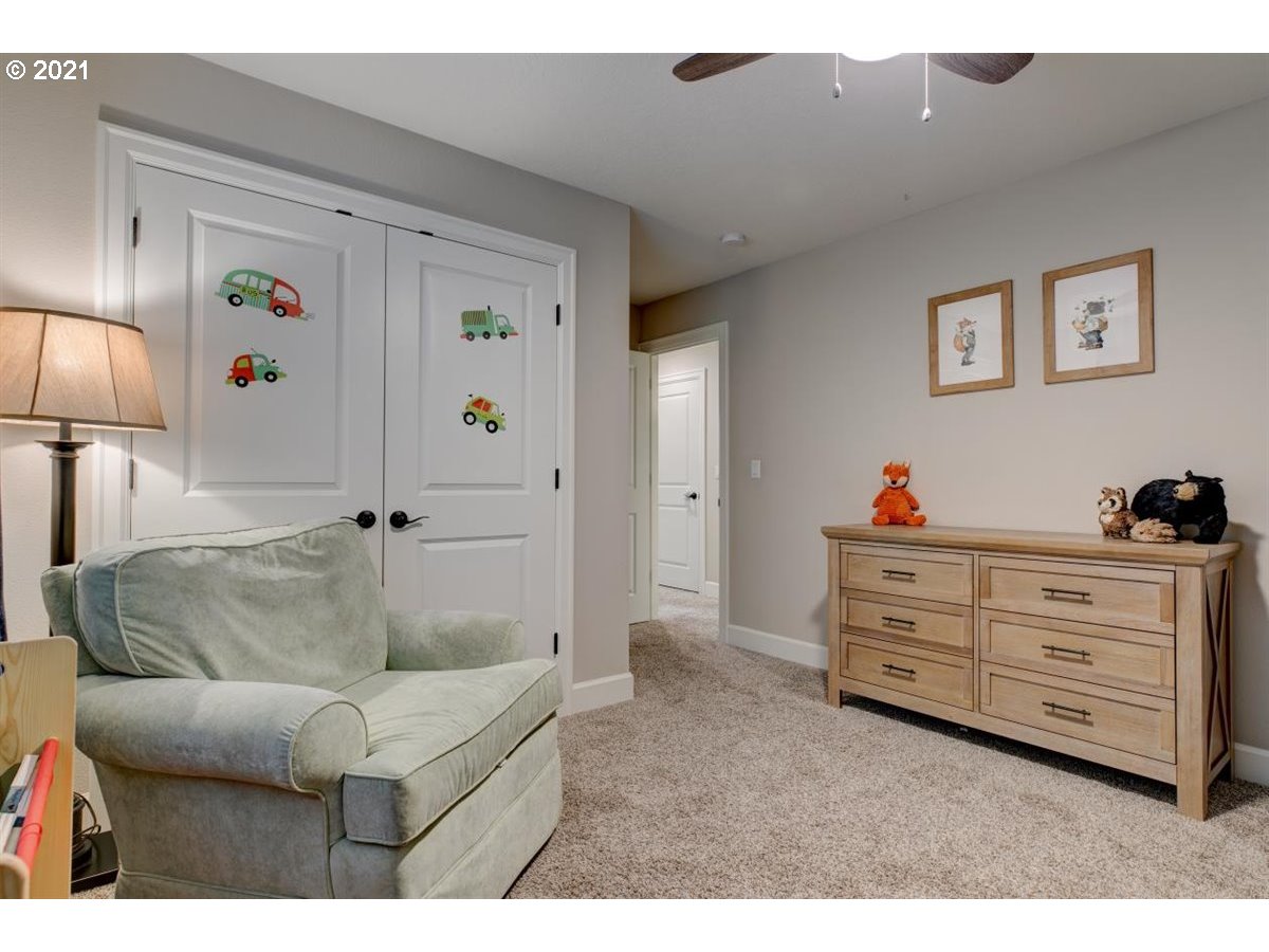 17468 Northwest Woodrush Way Portland, OR 97229 - Photo 21 of 32 a living room with furniture and a couch