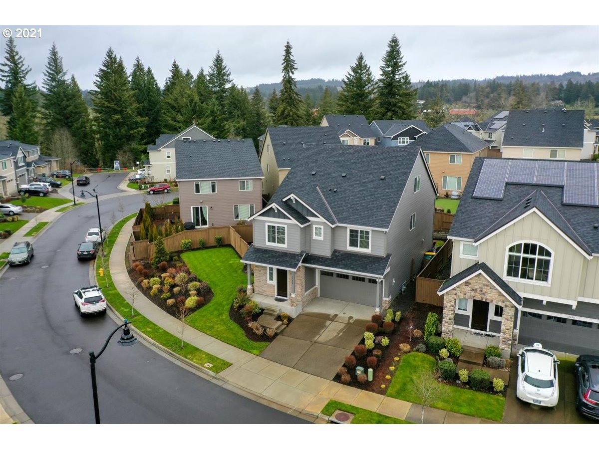 17468 Northwest Woodrush Way Portland, OR 97229 - Photo 30 of 32 an aerial view of a house with garden space and street view